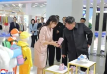 Kim Jong Un Makes Surprise Appearance at Clothing Expo as Rumors of Death Circulate Kim Jong Un at clothing expo